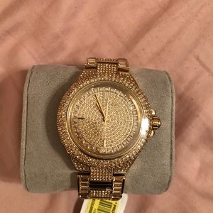 MK women’s Camille Gold-tone watch